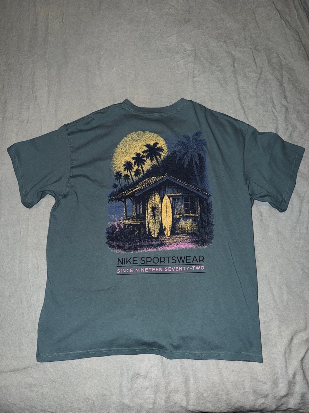 Nike Teal Graphic Surf Tee with Yellow Accents